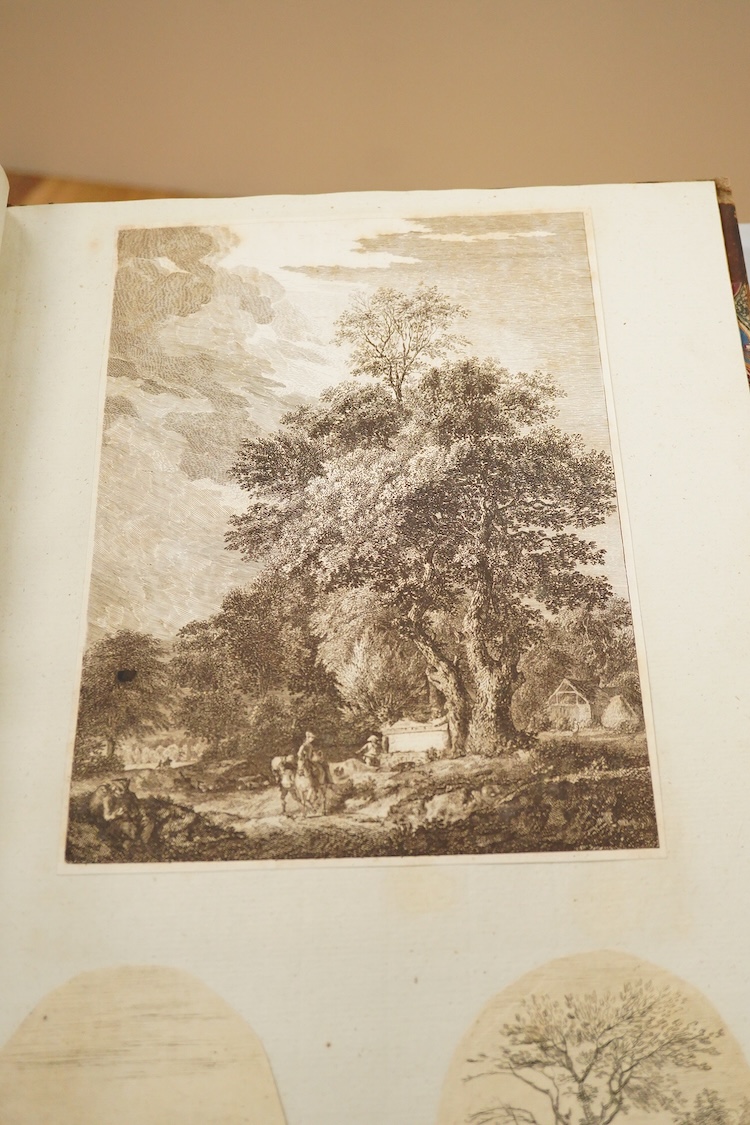 After Paul Sandby RA (1731-1809), an album of etchings and prints, various landscape and figural studies, some inscribed ‘Sandby fecit’, in pencil, with leather binding and marbled end pages. (Front cover detached)